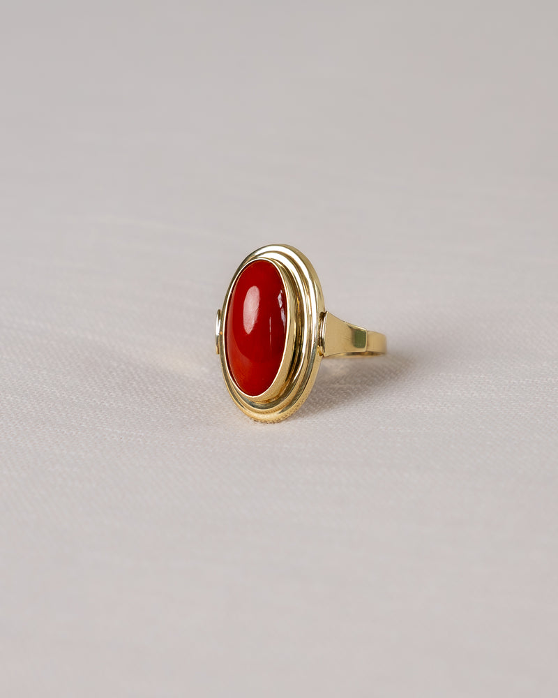 8k yellow gold ring and oval red stone